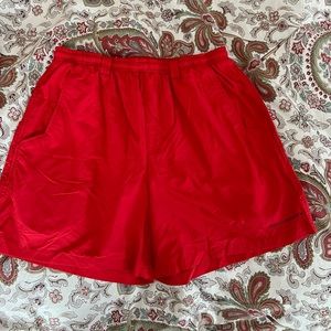 Red Columbia OmniShade swim shorts. Medium. New without tags.